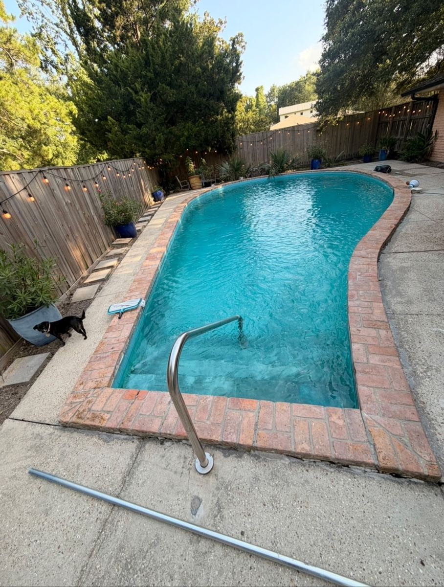 Clean, clear pool maintained by Integrity Touch
