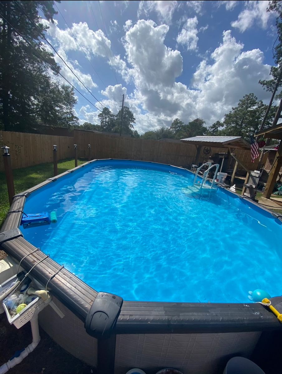 Clean, clear pool maintained by Integrity Touch